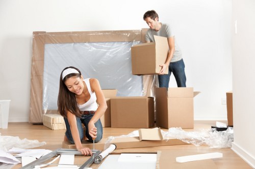 Removal team preparing items for a UK house move