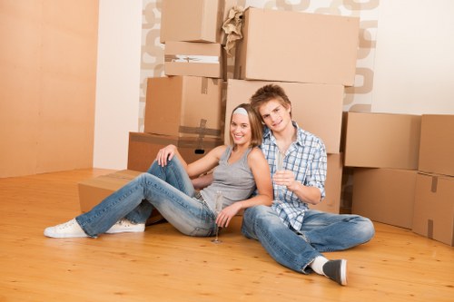 Furniture removals team planning a move in a St Johns Wood residential street