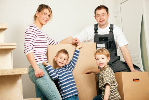 Packed moving boxes and household items ready for local transport