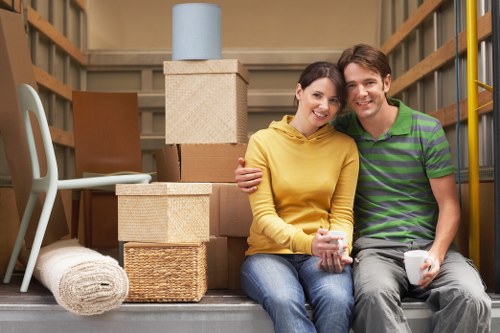 Loading furniture and boxes into a moving van in St Johns Wood