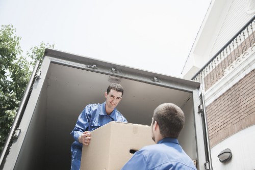 Careful loading of desks and office supplies during a commercial relocation