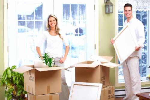 Moving crew protecting valuable items during a London relocation