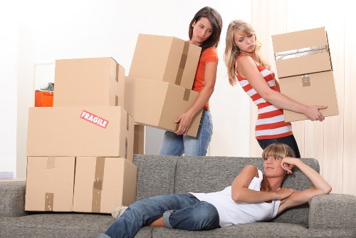 Packed household boxes and furniture prepared for a flat move in St Johns Wood