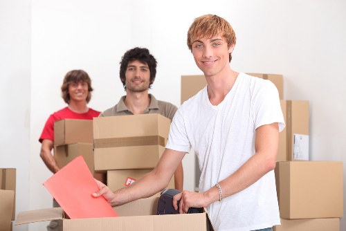 Careful handling of household furniture for a flat move in St Johns Wood